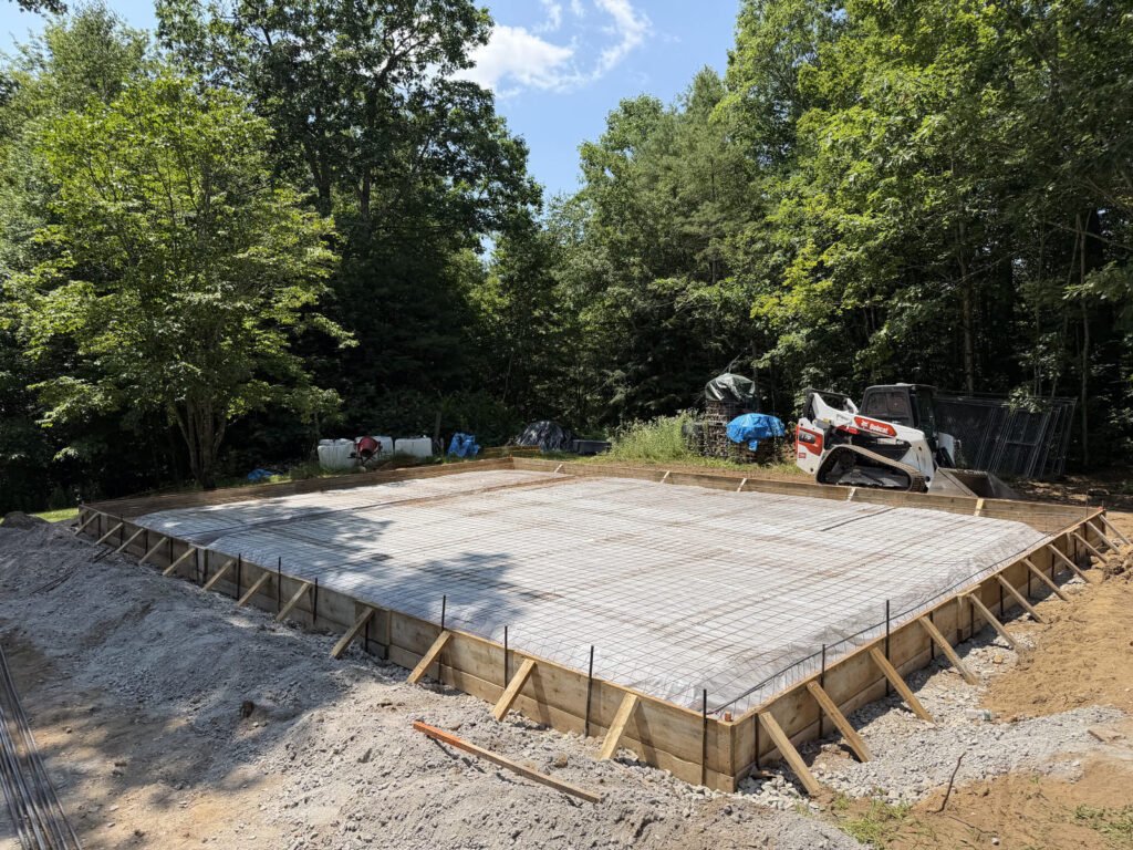 Monolithic slab forms and reinforcement before pouring