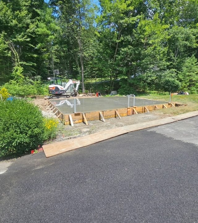 Concrete garage slab with perimeter forms still in place